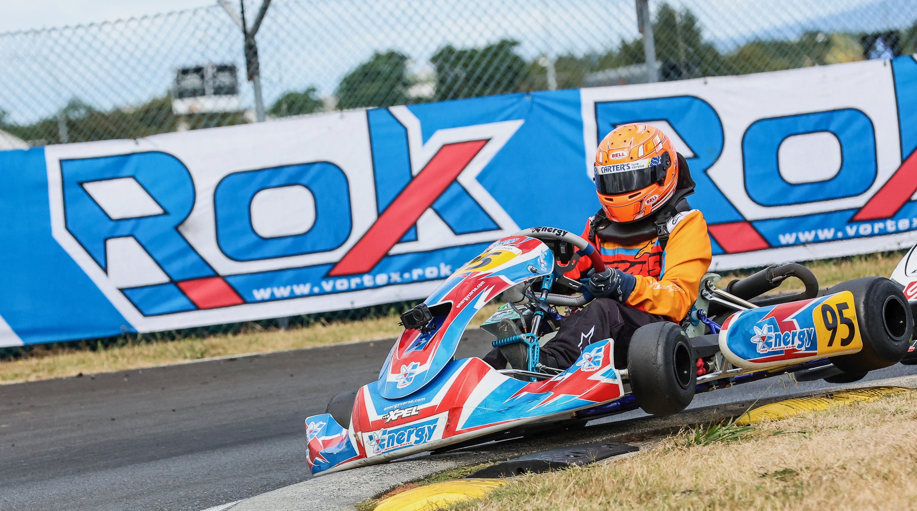 Kart racing with ROK banners